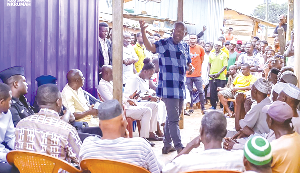 Kojo Oppong Nkrumah (2nd from left) interacting with leaders of the groups and the police after the engagements